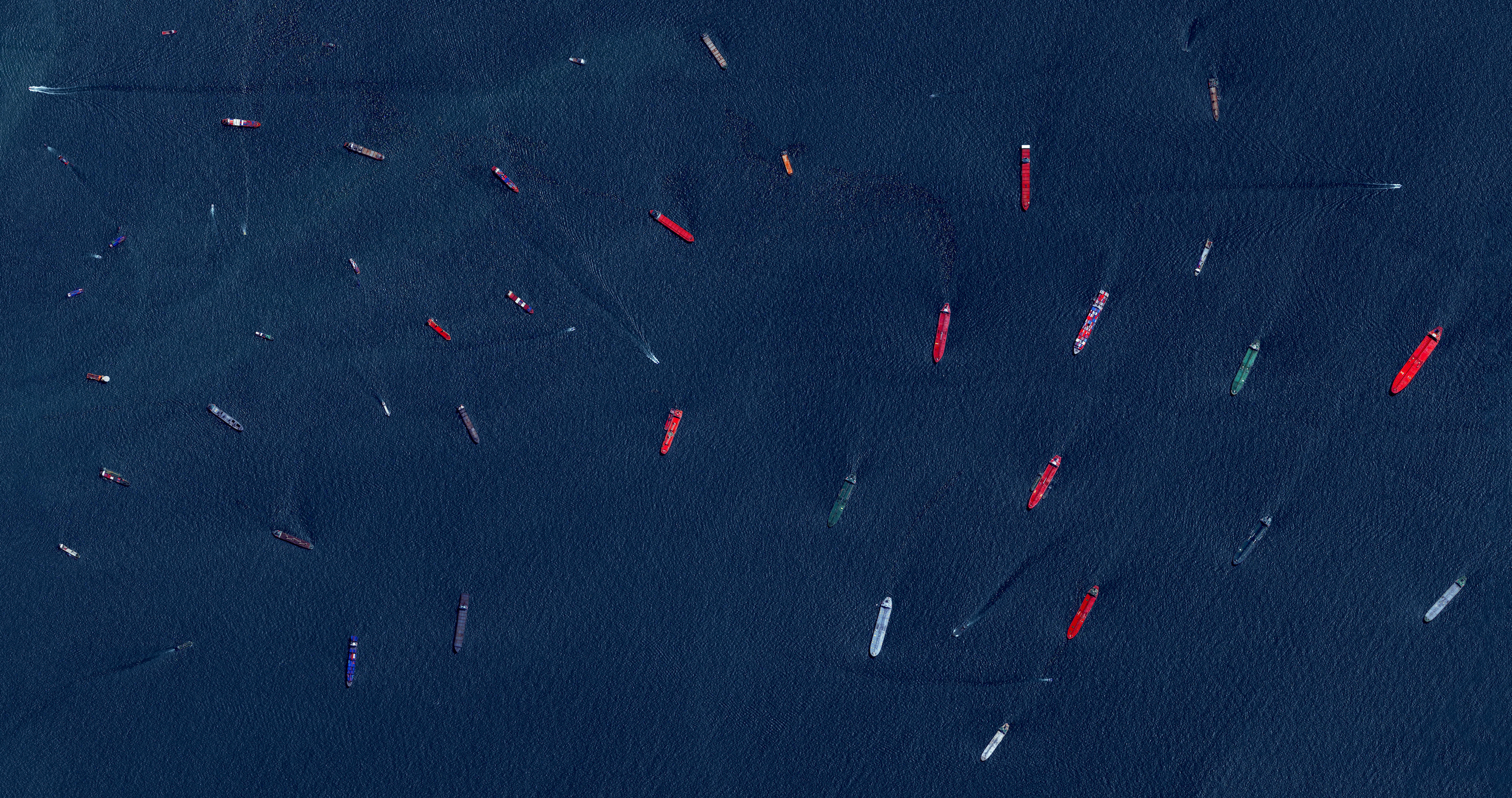 Port of Singapore: Cargo ships and tankers – some weighing up to 300,000 tonnes – wait outside the entry to the Port of Singapore. The facility is the world’s second-busiest port in terms of total tonnage, shipping a fifth of the world’s cargo containers and half of the world’s annual supply of crude oil.